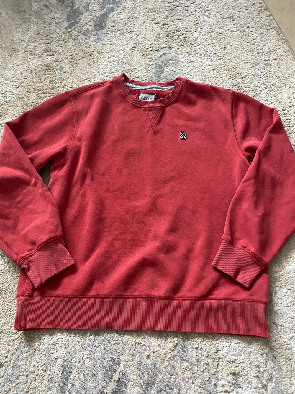 Vintage Izod Comfort Crewneck Sweatshirt in a faded red distressed logo Large